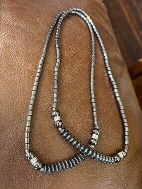 necklace of Metallic beads — two